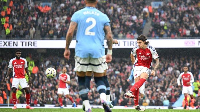 hasil-liga-inggris-wolves-vs-arsenal-0-1-gol-calafiori-selamatkan-the-gunners_97ec630.jpg